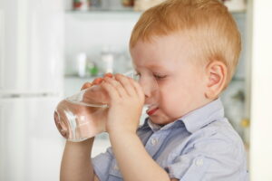 boy-drinking-glass-of-water