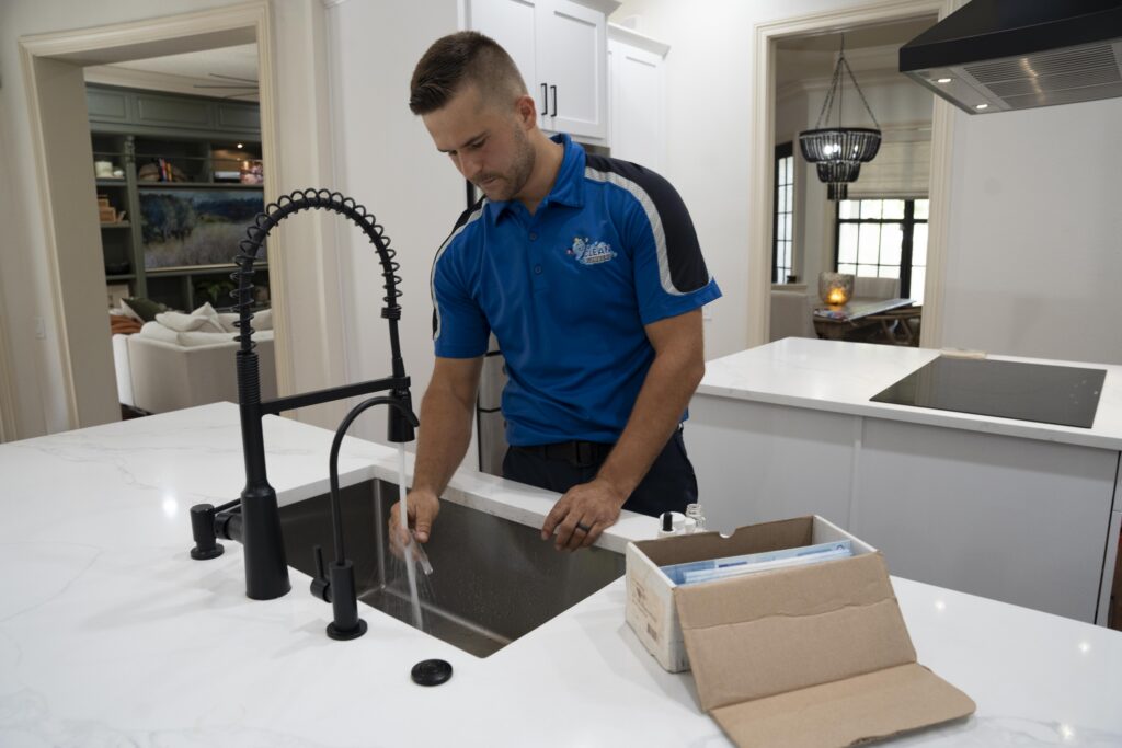 plumber in tampa fixing sink